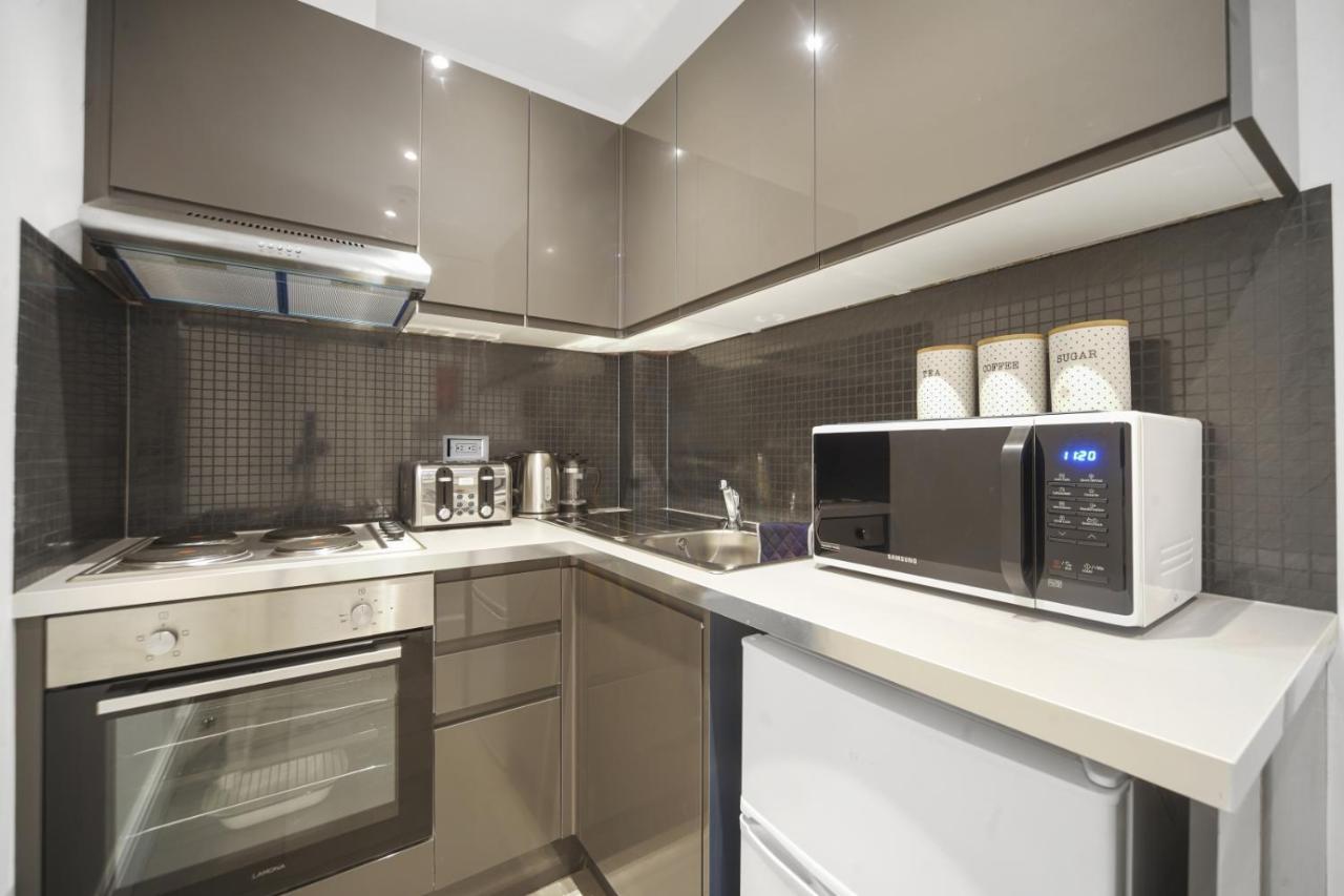 Studio Apartment By Homely Stays Londra Esterno foto